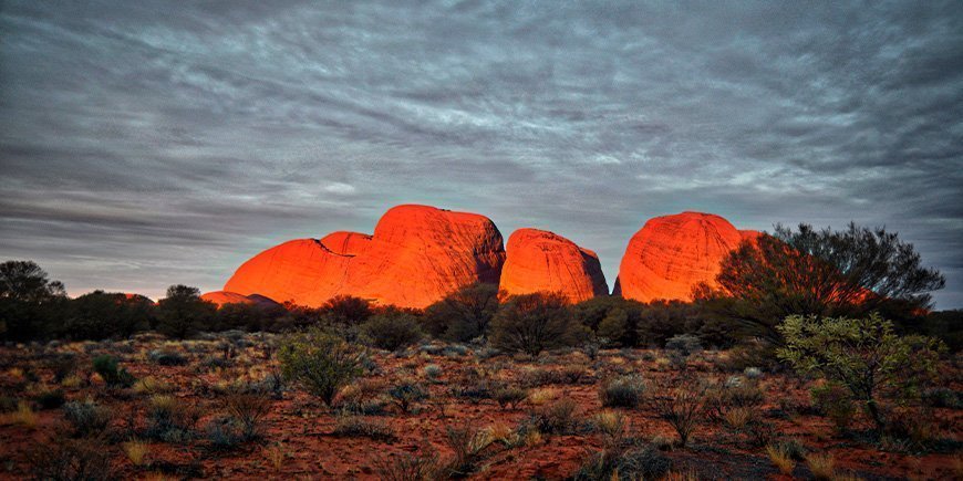 Solnedgang ved Kata Tjuta i Australien 
