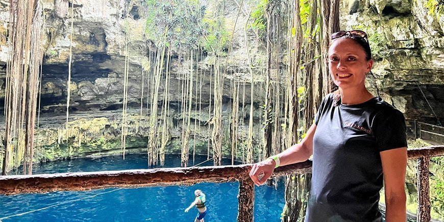 Christina standing in the Oxman cenote in Mexico