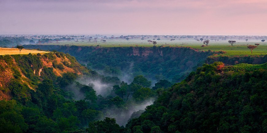 Solopgang ved Kyambura Gorge i Uganda